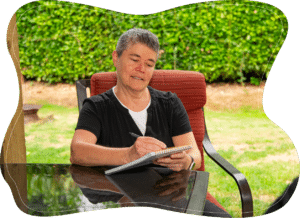 occupational therapy session, Portland, Julie Allen therapist writing treatment notes, OT planning process, mental health services near me