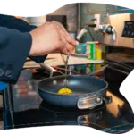  Hands cracking eggs into a pan, symbolizing daily routines, nourishment, and building healthy, supportive habits.